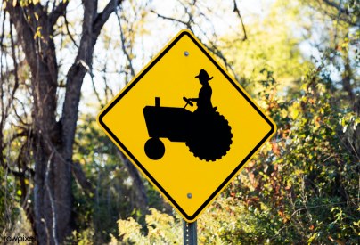 Road sign of slow moving tractor in Holmes County, Ohio. Origina